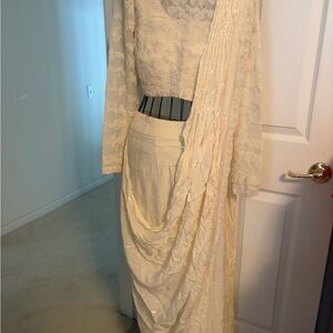 Elegant Cream Embroidered Saree